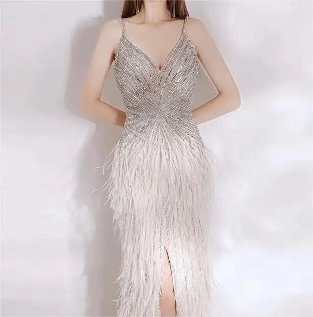 Stunning White and Silver Hand worked Dress with Feathered Bottom